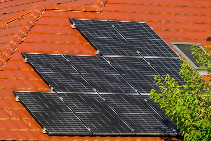 Inspect Solar Panels On A Roof